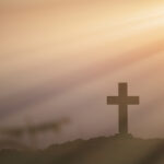 Resurrection concept:Crucifixion Of Jesus Christ Cross At Sunset