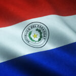 Closeup shot of the waving flag of Paraguay with interesting textures