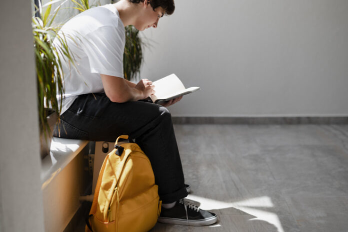 close-up-boy-reading-school
